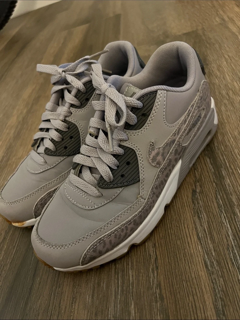Nike Gray Sneakers with Subtle Leopard Swoosh